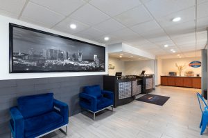 Spacious and welcoming lobby at Baymont by Wyndham Nashville Airport, featuring modern seating, clean design, and friendly staff—reflecting the hotel's reputation for cleanliness, excellent service, and convenient location near Nashville International Airport