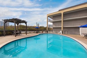 Seasonal outdoor pool at Baymont Nashville Airport hotel open for guest relaxation